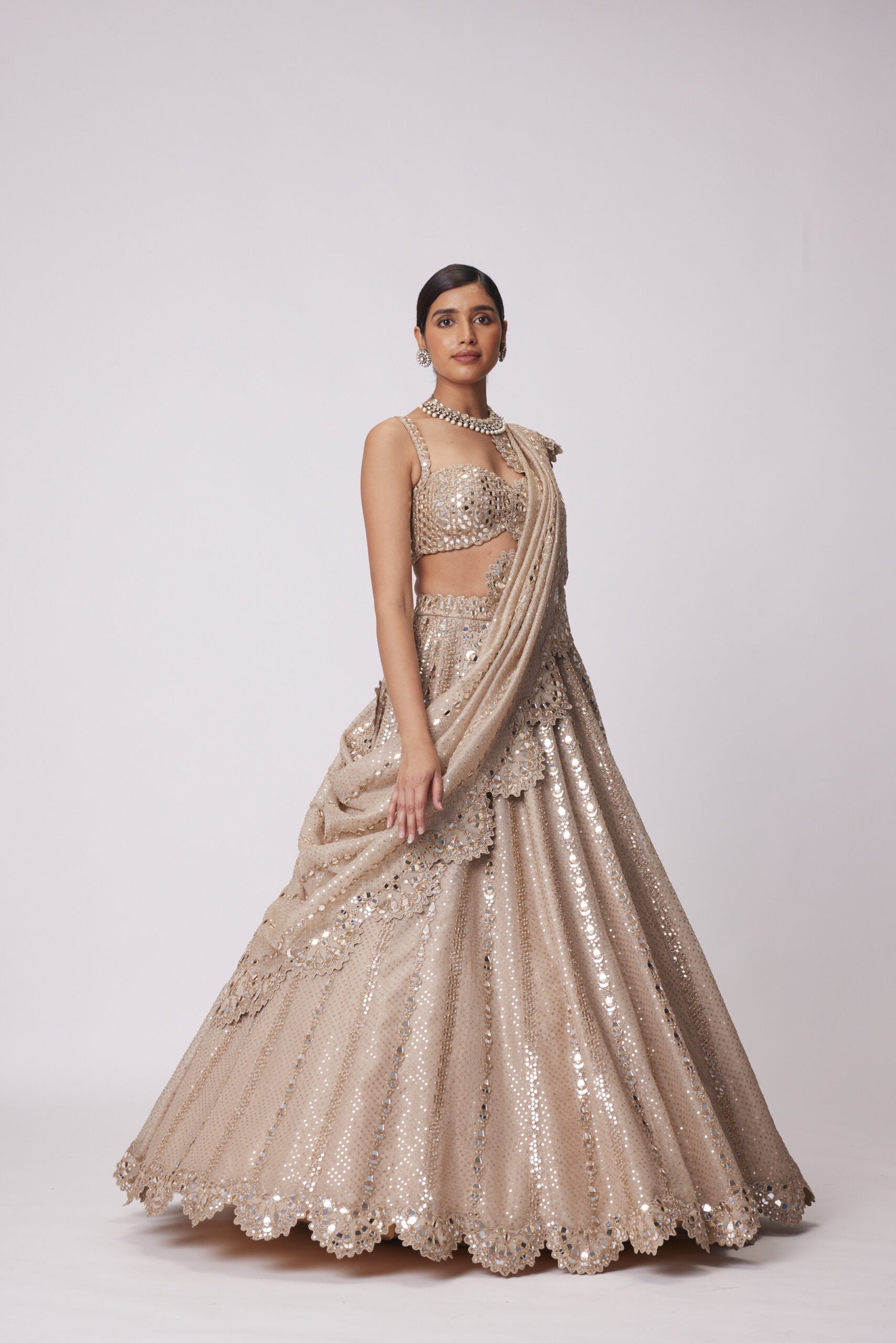 Image of LIGHT BEIGE SEQUIN EMBROIDERED LEHENGA SET