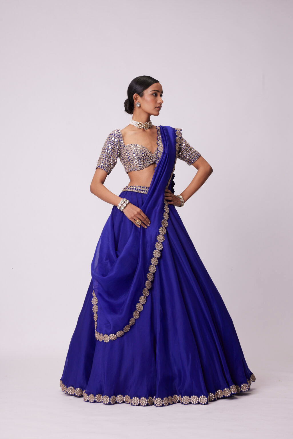 Image of PERSIAN BLUE ORGANZA HAND EMBROIDERED LEHENGA SET