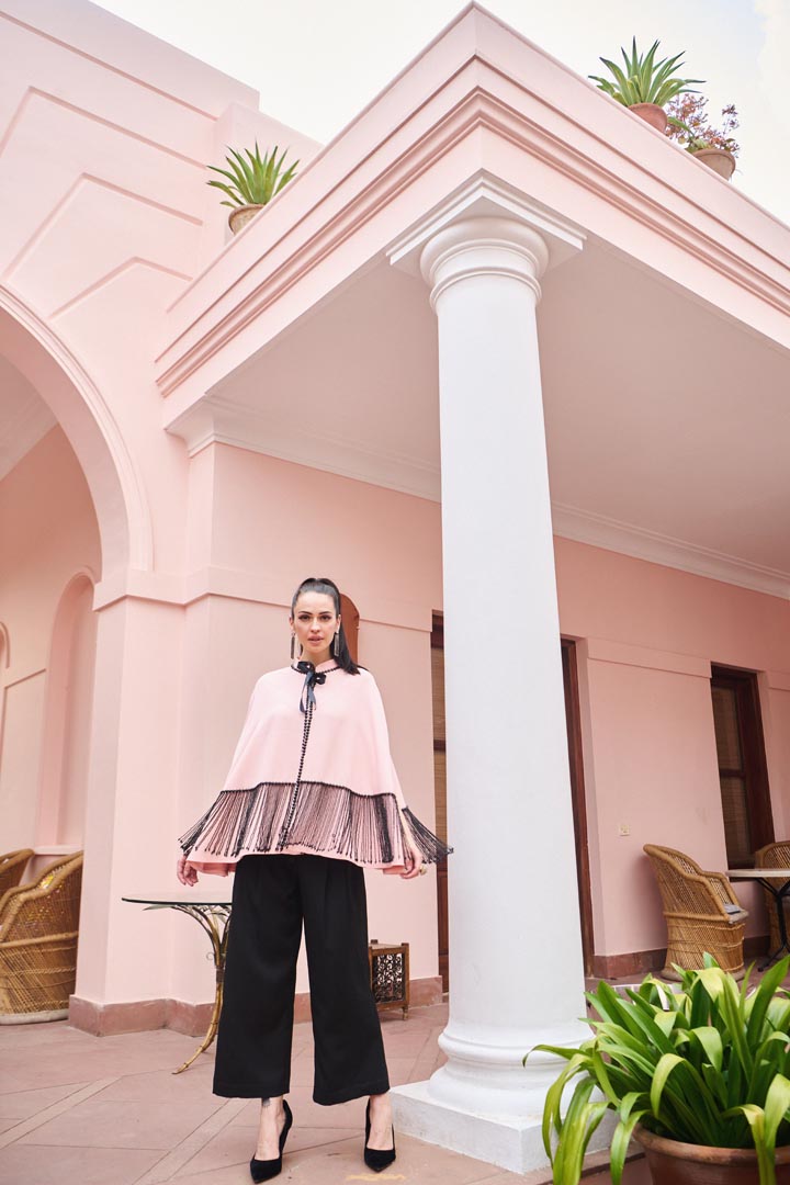 black and pink strings cape