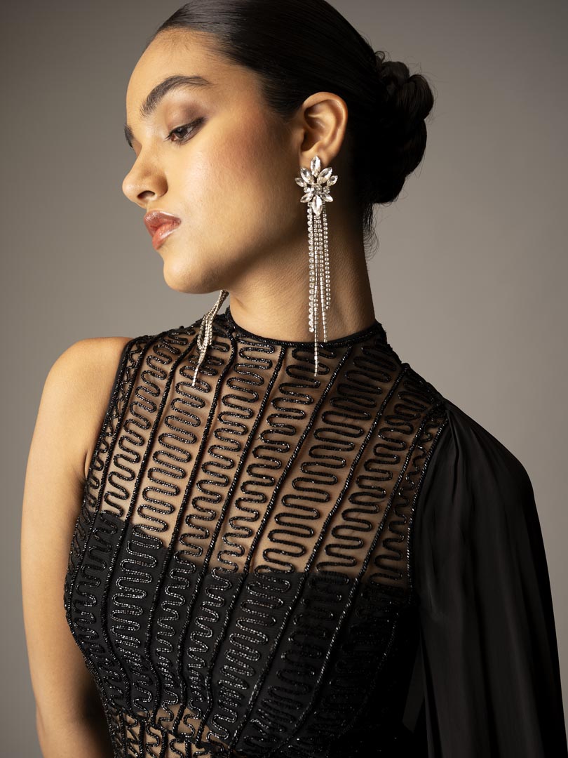 Black round neck  saree gown with pre-drape & cuttdana embellishment all over.