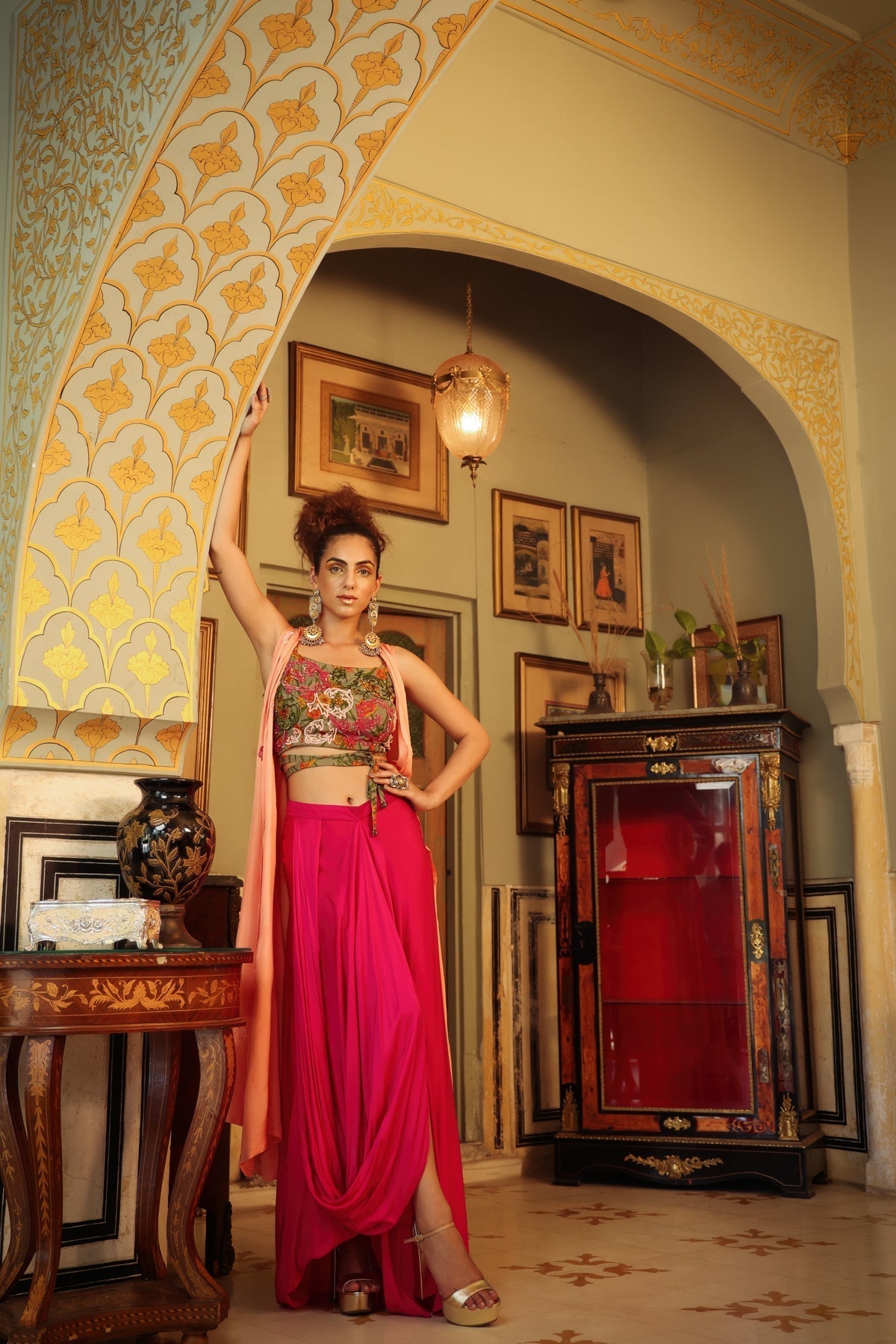 Image of Dilruba sage green peach hot pink rangeen sitara tie up top with drape skirt and cape set