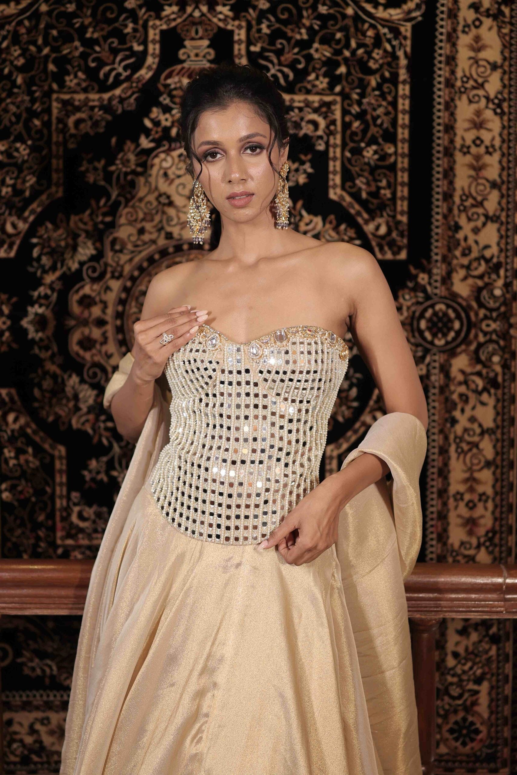 The " Sitara " spark lehenga set / Ivory-gold kundan and mirror embellished corset lehenga set