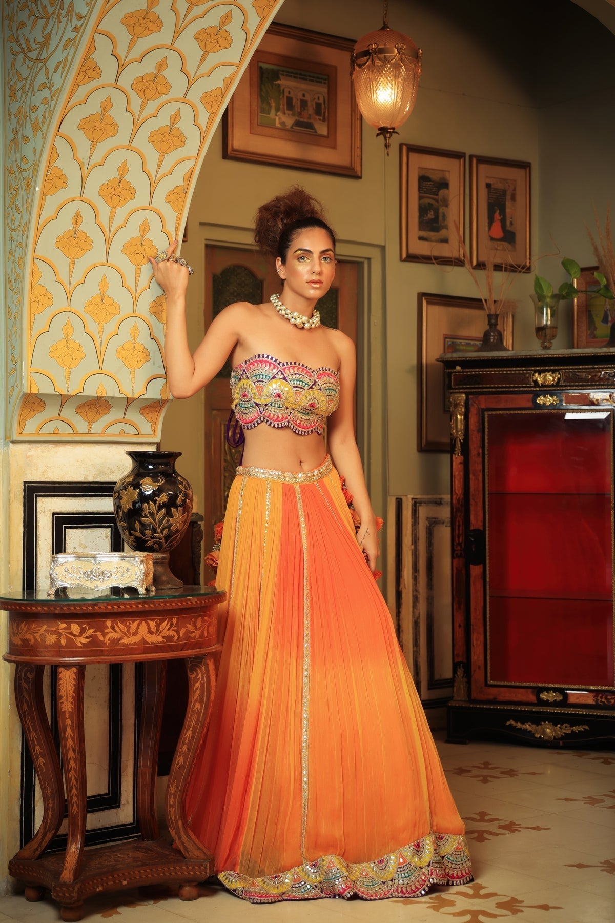 Image of Dilruba bejewelled gotapatti bandeau blouse and sunset ombre lehenga and scalloped shrug set