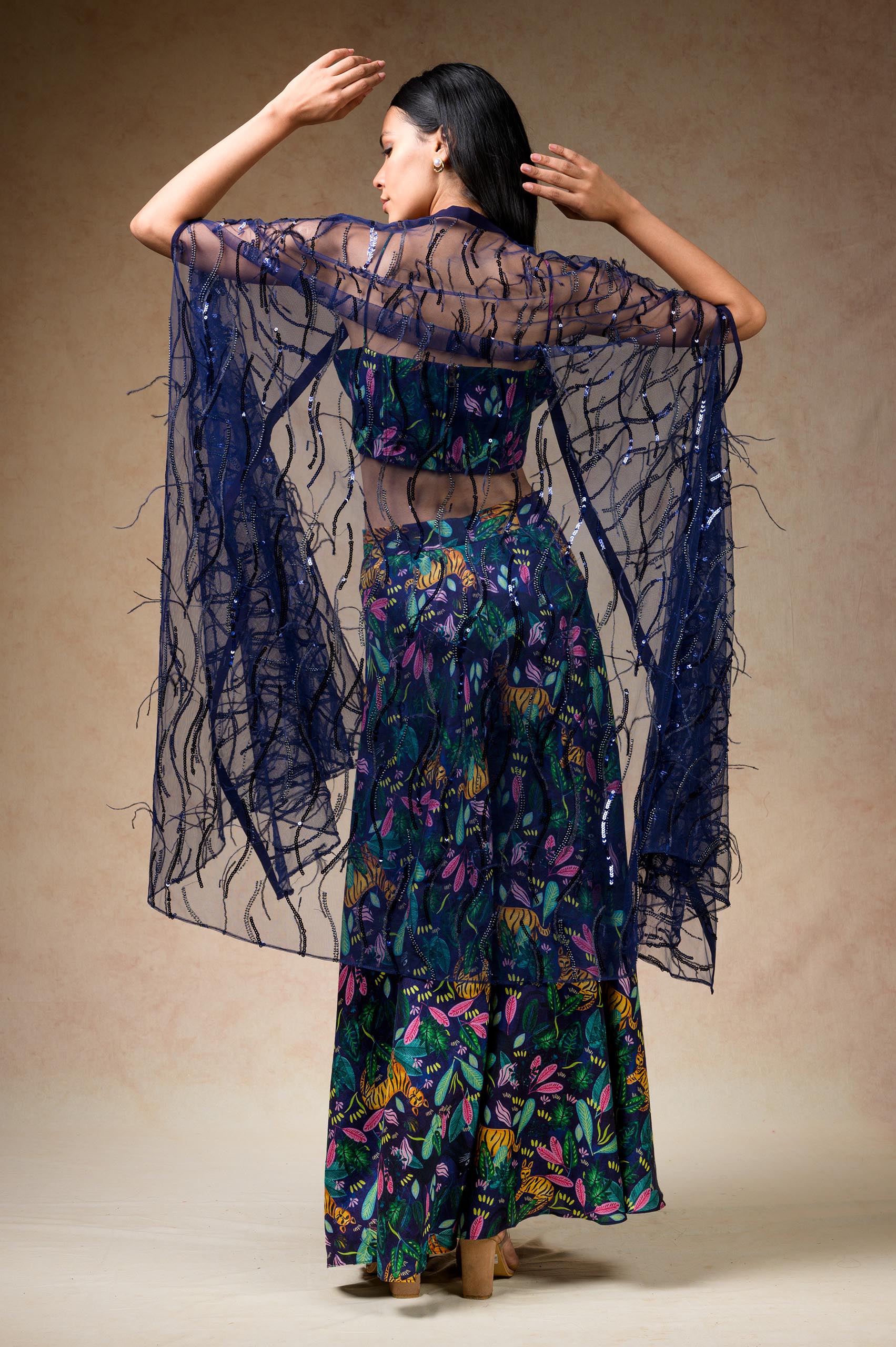 Bustier with sharara and feather cape