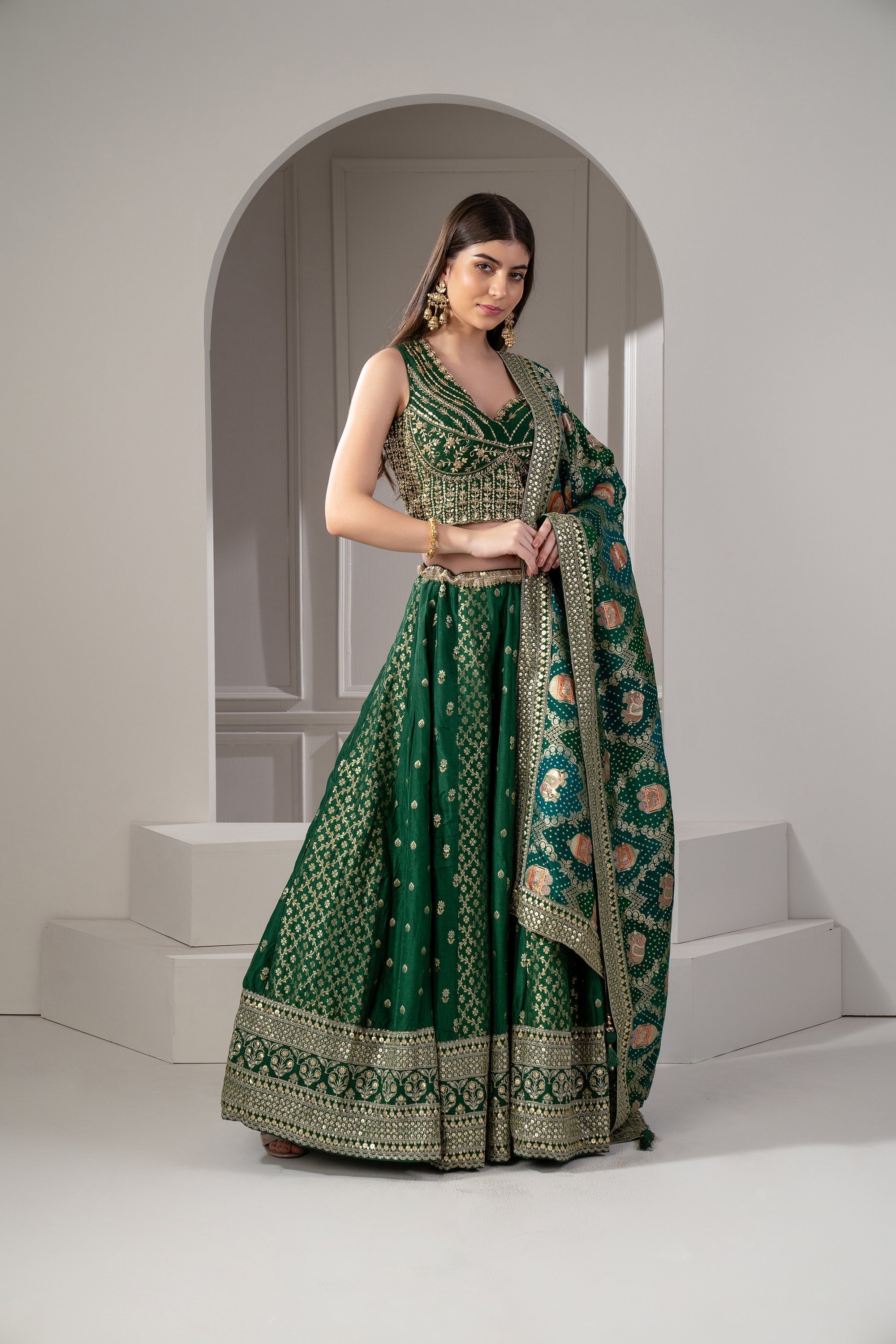 Castleton Green Sequins, Zari And Thread Embroidered Semi Silk Lehenga Set.