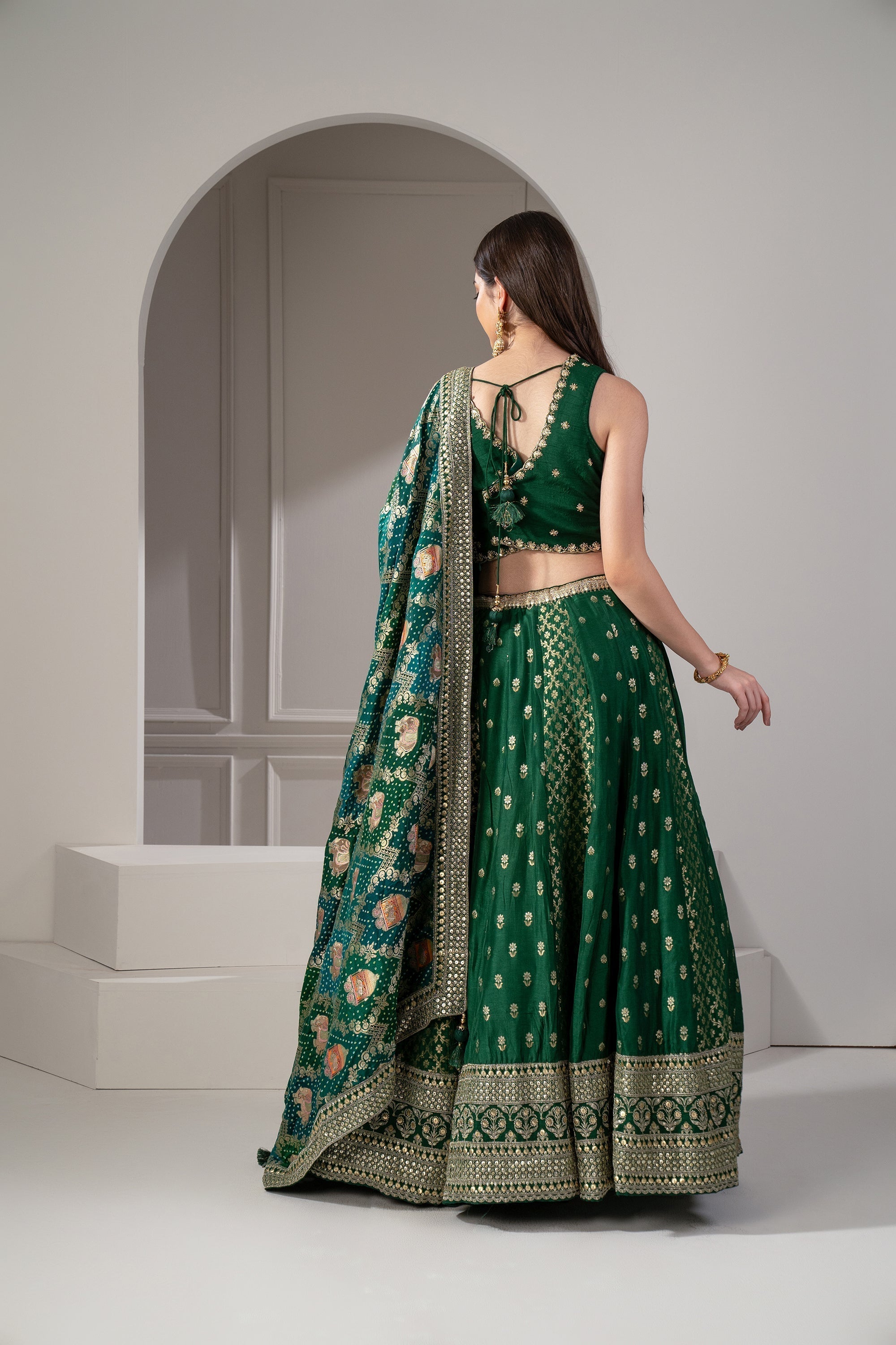 Castleton Green Sequins, Zari And Thread Embroidered Semi Silk Lehenga Set.