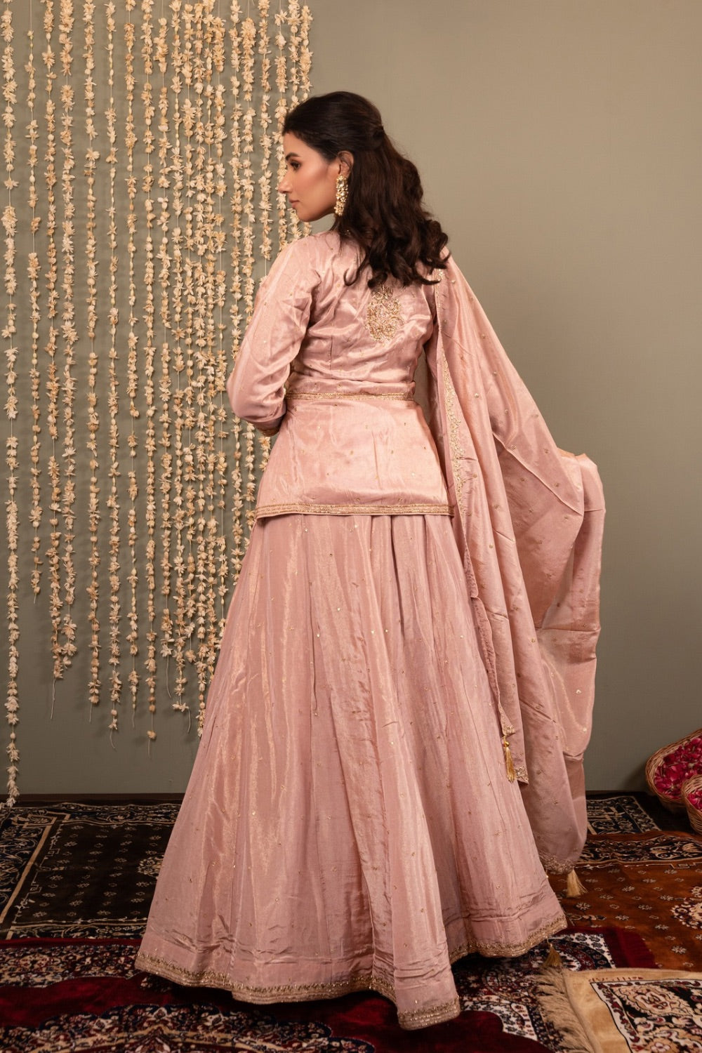 Dusty pink tissue silk lehenga choli with handwork