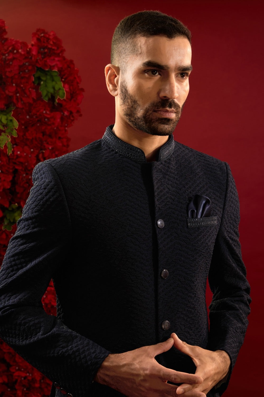 Black silk suit with hand work on neckline and pocket