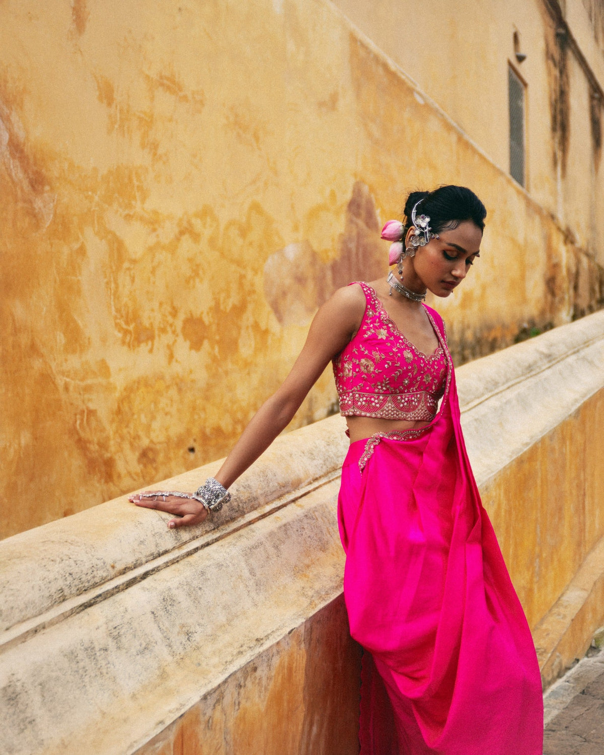 Bright fuschia draped saree