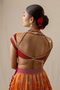 Radiant orange and red printed bandhej lehenga set