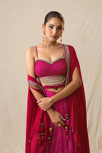 Fuchsia pink printed bandhej drape skirt set