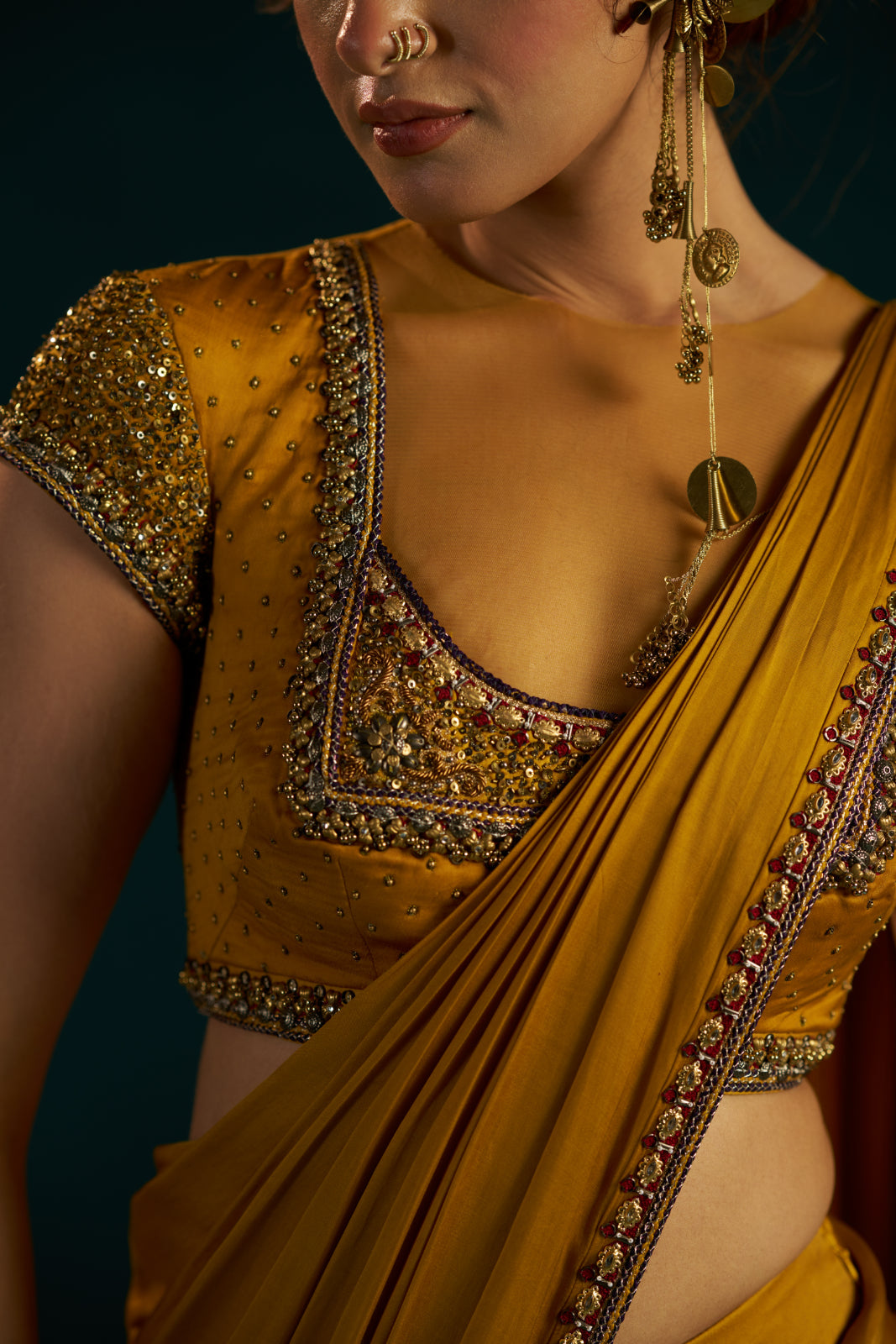 Mustard Yellow Modal Satin Drape Saree with Hand-Embellished Blouse.