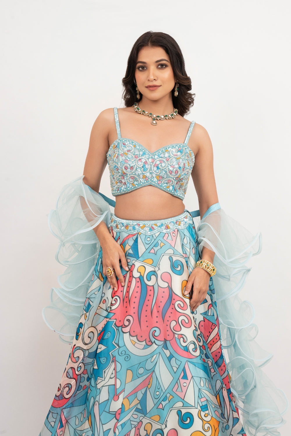 Blue organza lehenga choli with sequins work, hand cut dana work and pearls