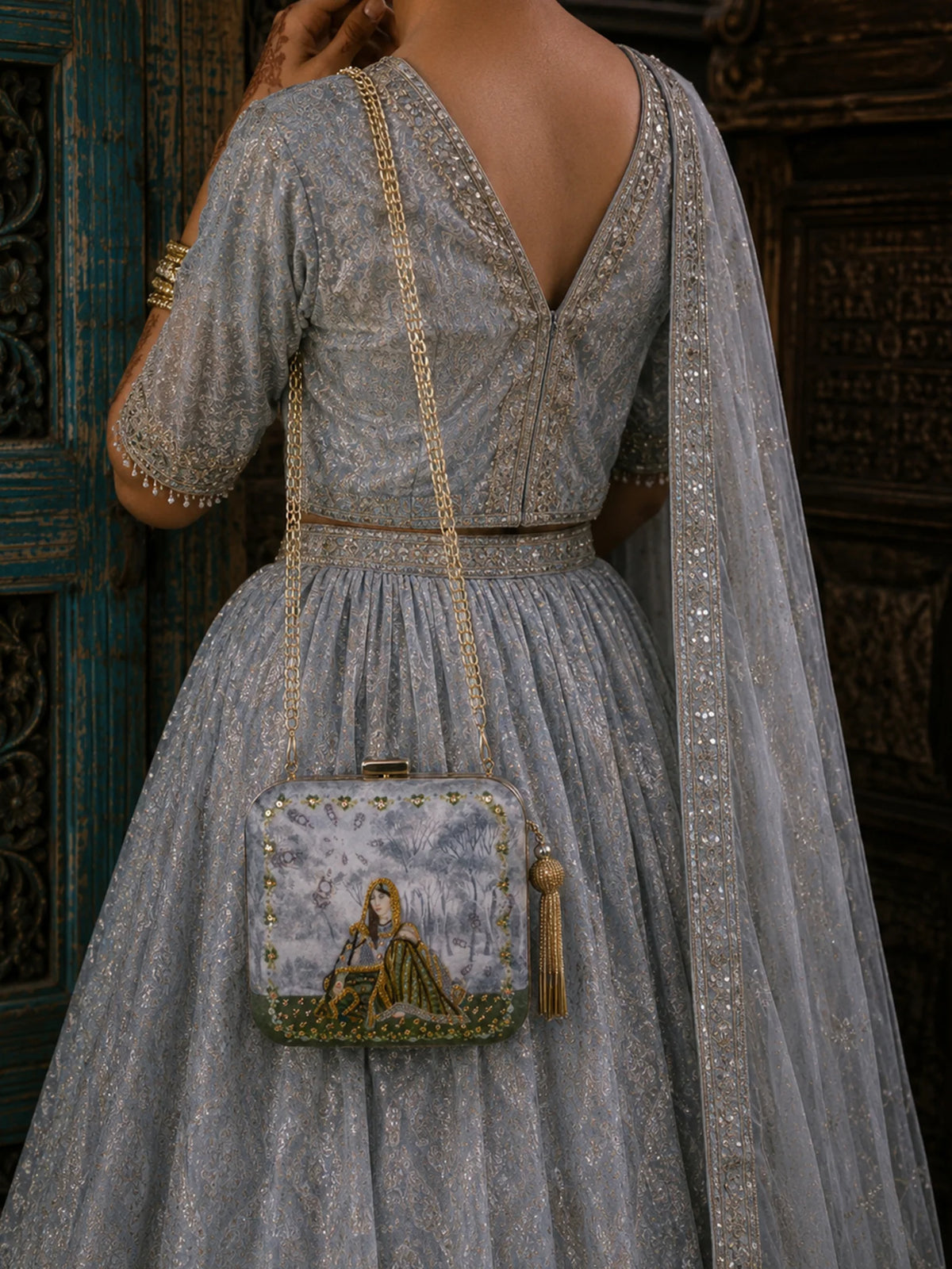 Indian Queen Portrait Embellished Clutch Bag with Gold Tassel