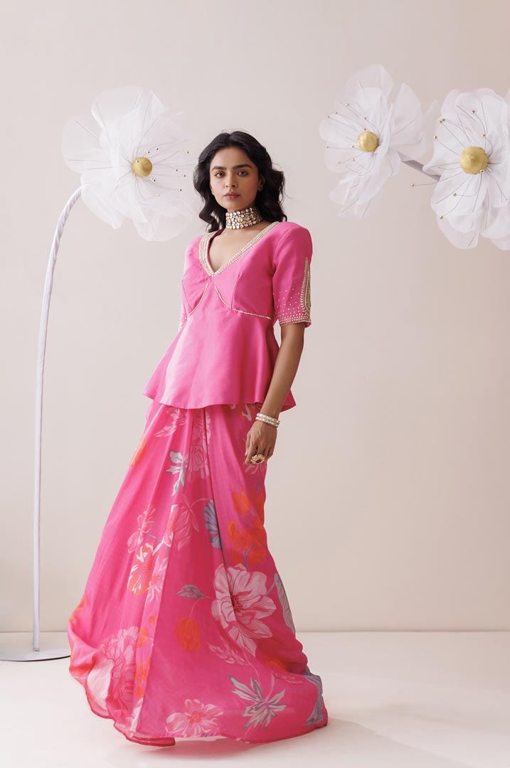 Pink peplum blouse and skirt set