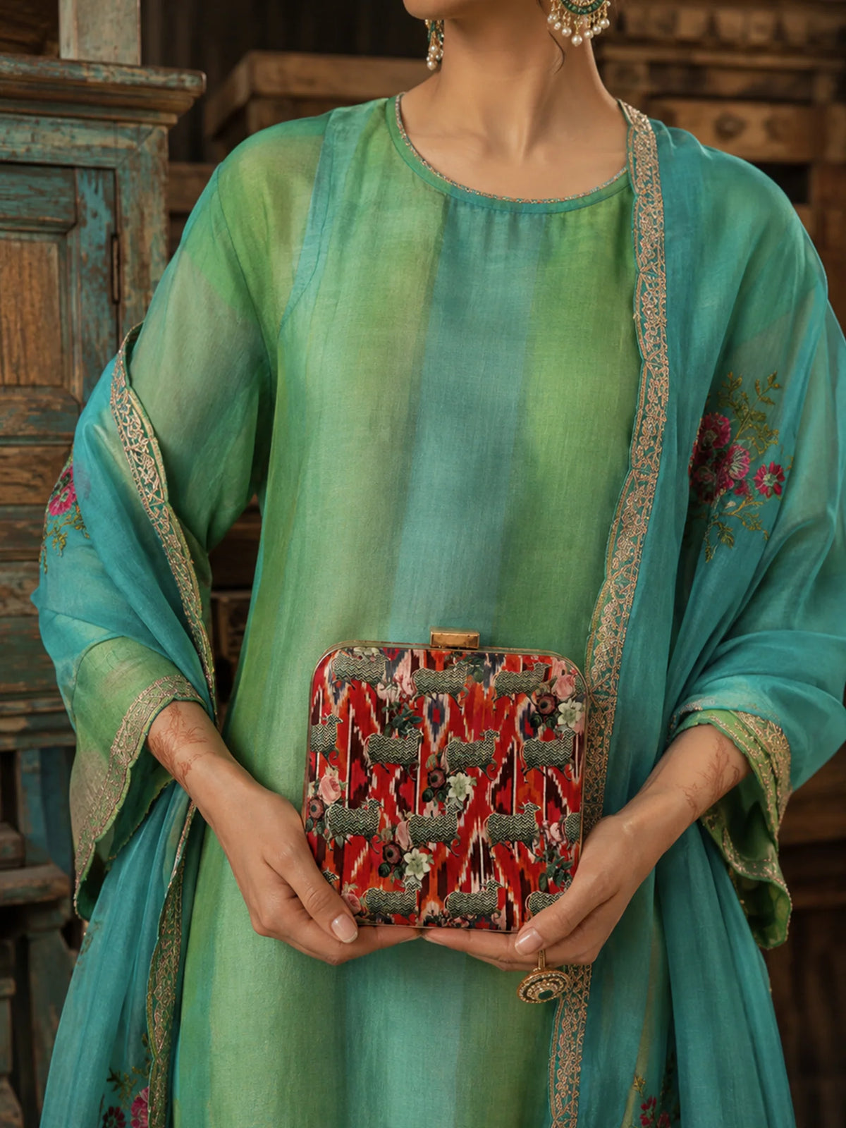 Ikat & Pichwai Cow Print Clutch Bag with Floral Artwork