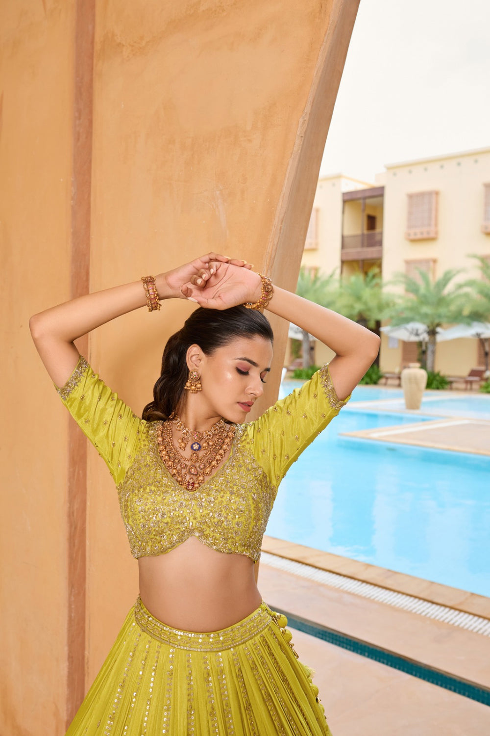 Lemon yellow silk lehenga choli with thread and sequins work