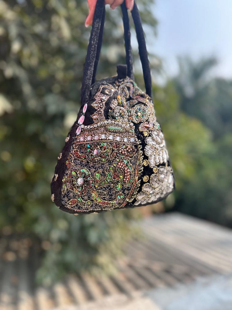 Royal Heirloom Embellished Black Potli Bag for Festive Occasions