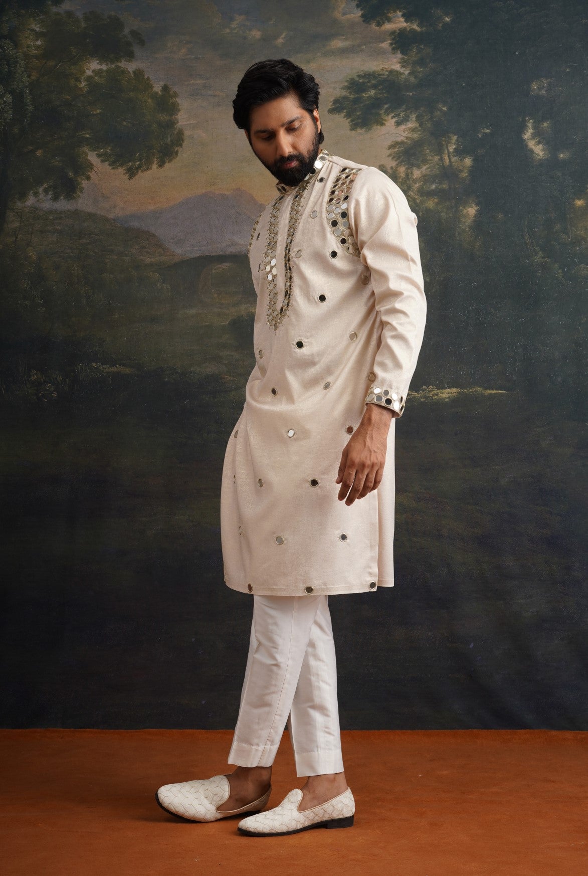 Ivory gold hand embroidred round mirror work kurta set
