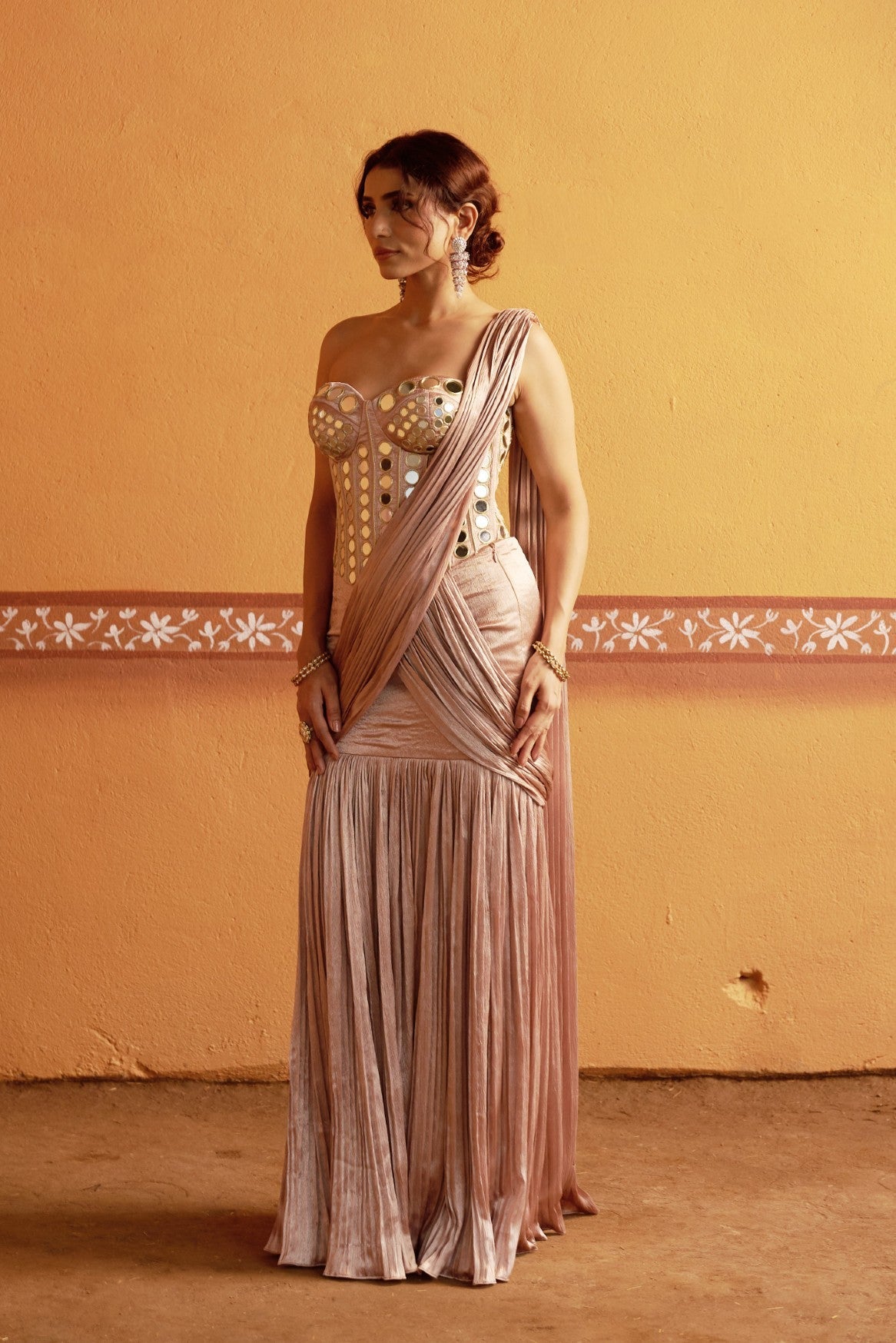 Hand embroidered corset with pleated pre draped saree
