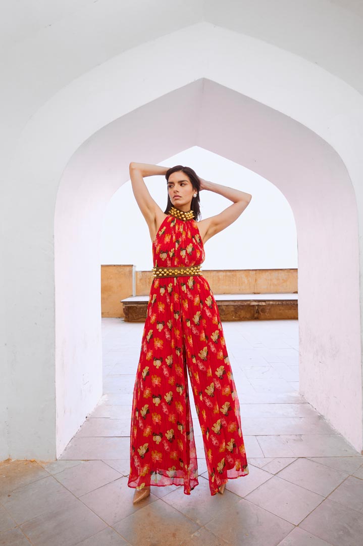 Image of Gulbahar Chilly red bell jumpsuit with belt