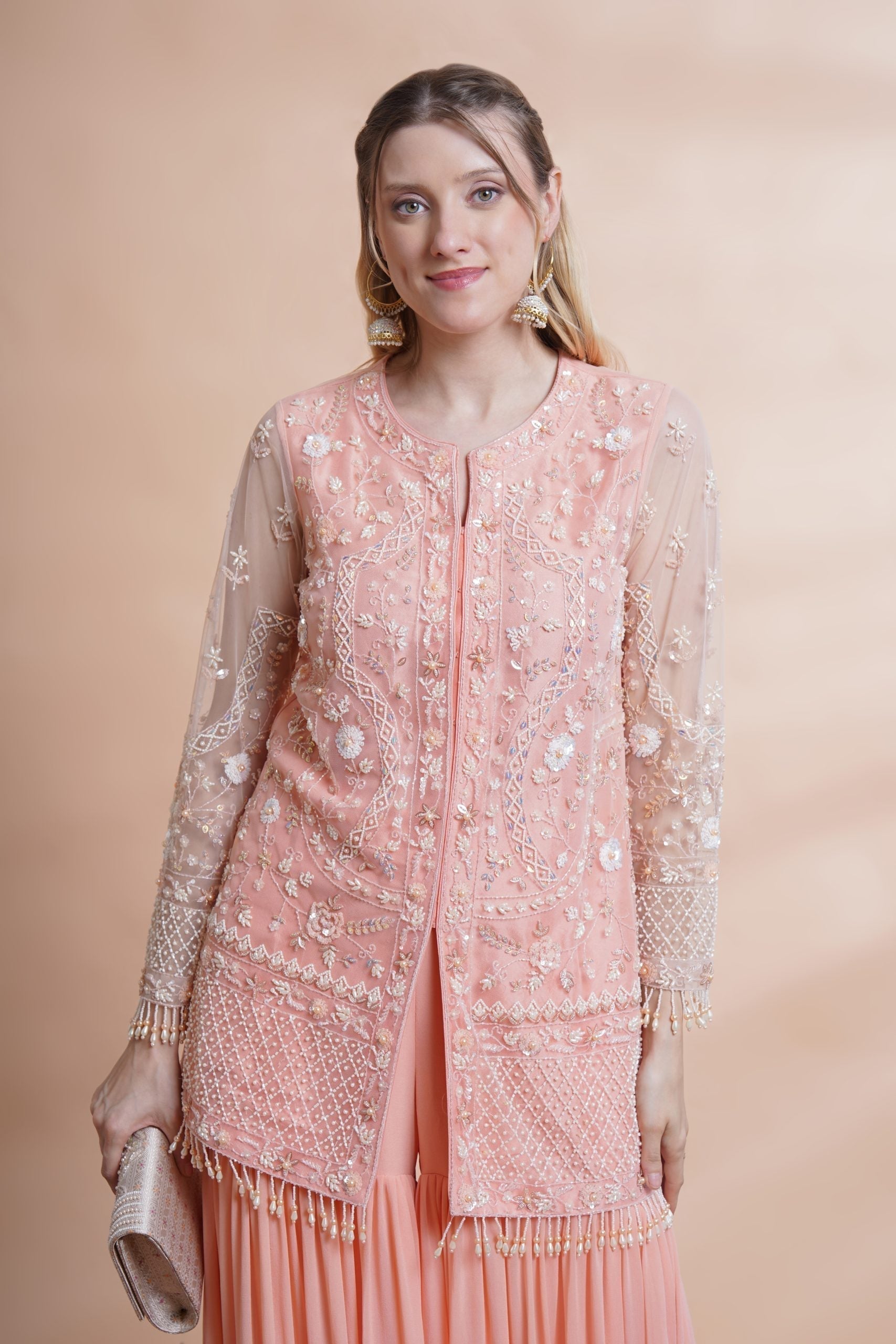 Image of Peach net kurta sharara set