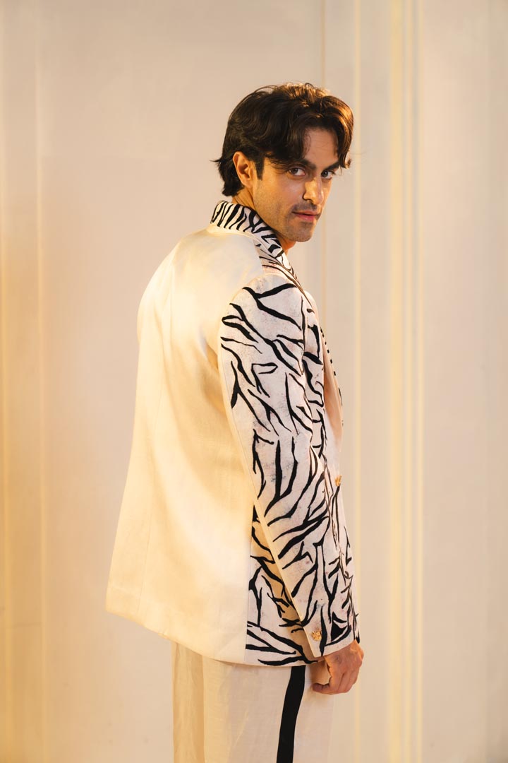 Concept blazer with hand paint and hand embroidery. paired with a matching kurta and trousers.