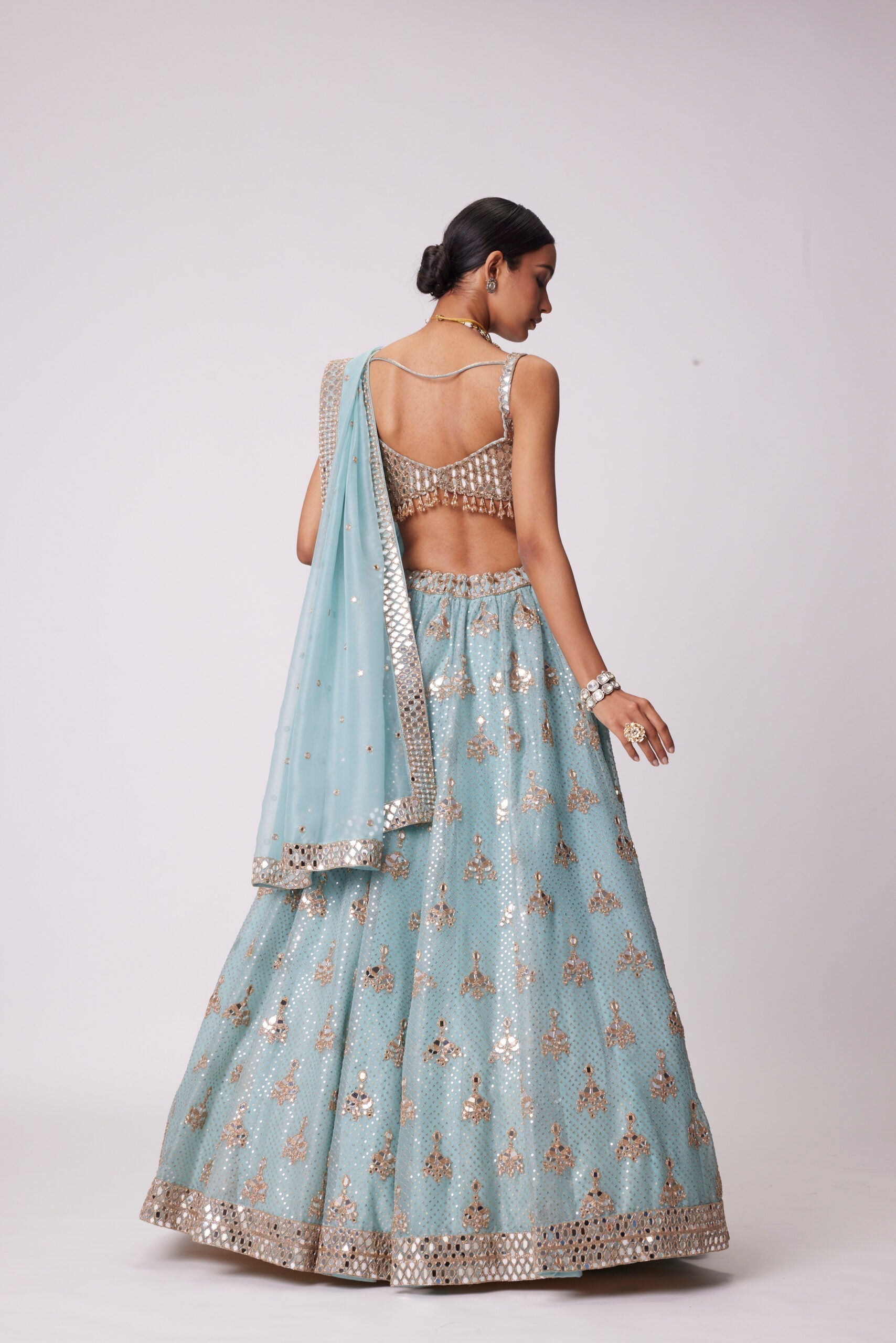 Image of POWDER BLUE ORGANZA SEQUIN EMBROIDERED LEHENGA SET