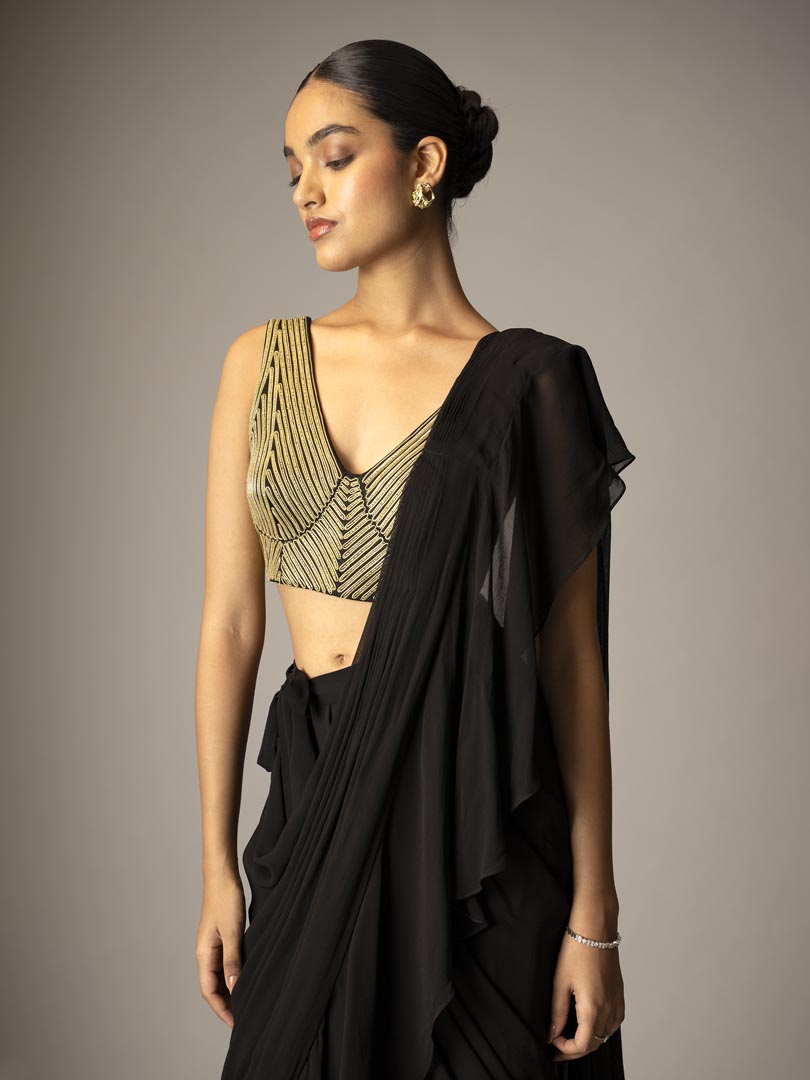 Black pre-draped saree gown
with metallic 3D dori Embellished blouse.