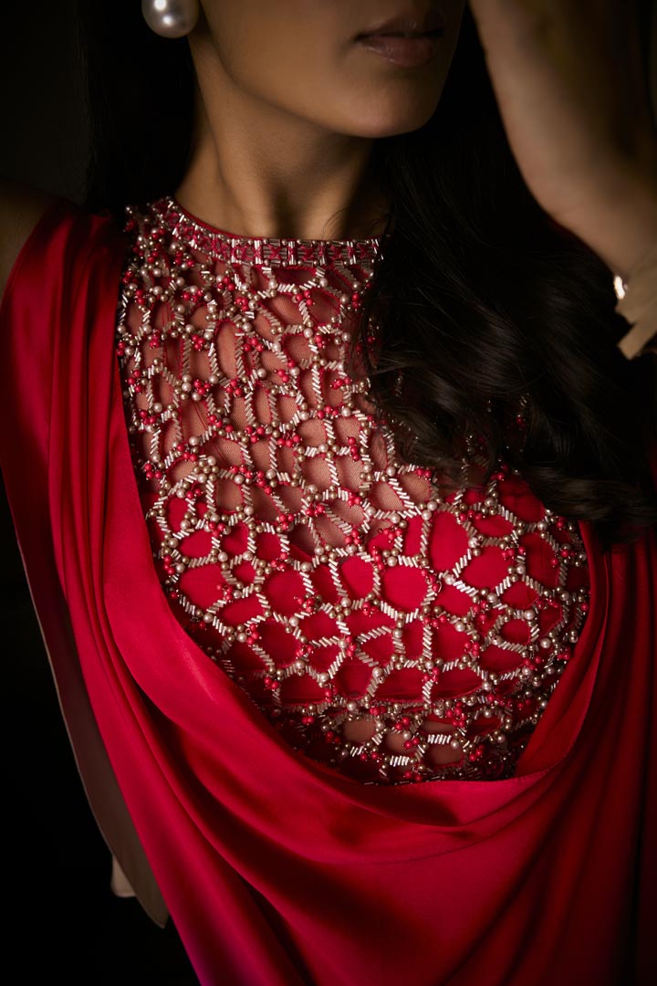 A pure silk satin sangria ombré tunic with tulip pants, detailed with bead and crystal embroidery.