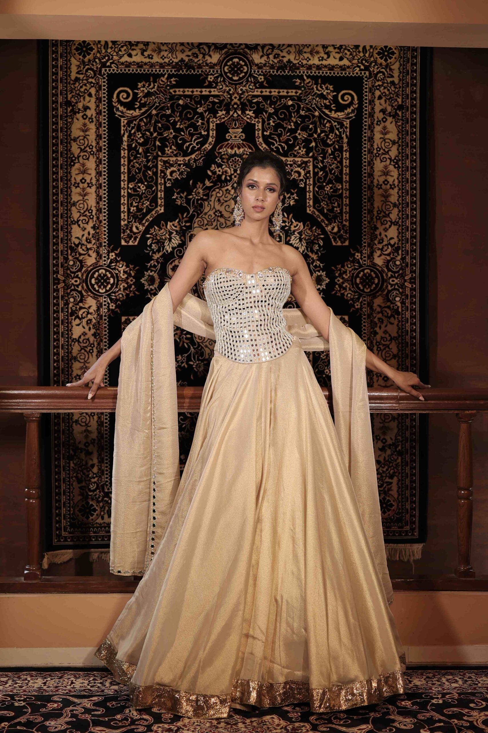 The " Sitara " spark lehenga set / Ivory-gold kundan and mirror embellished corset lehenga set