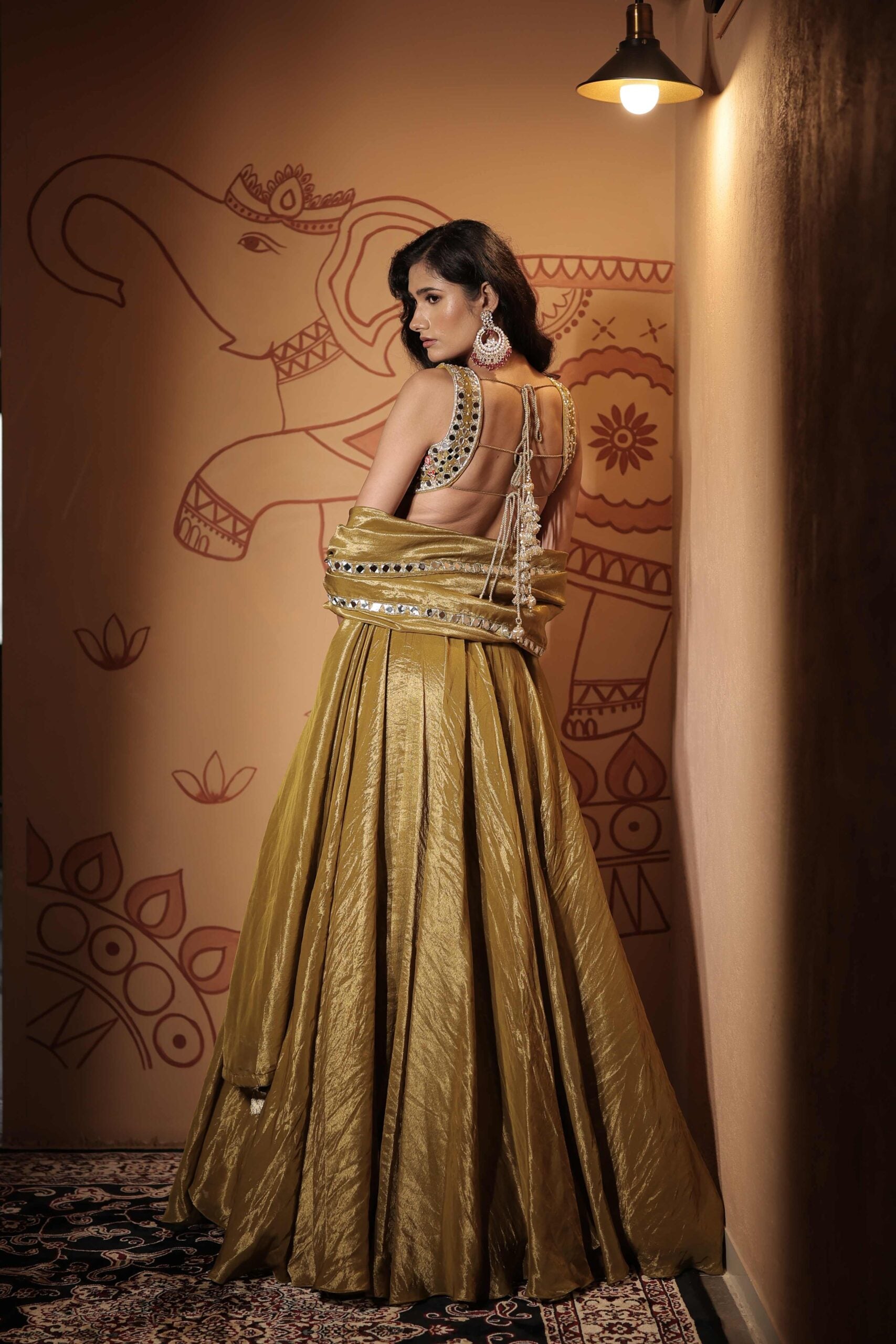The " Sheesh Mahal" lehenga set /olive green jewel and mirror embellished tissue lehenga set