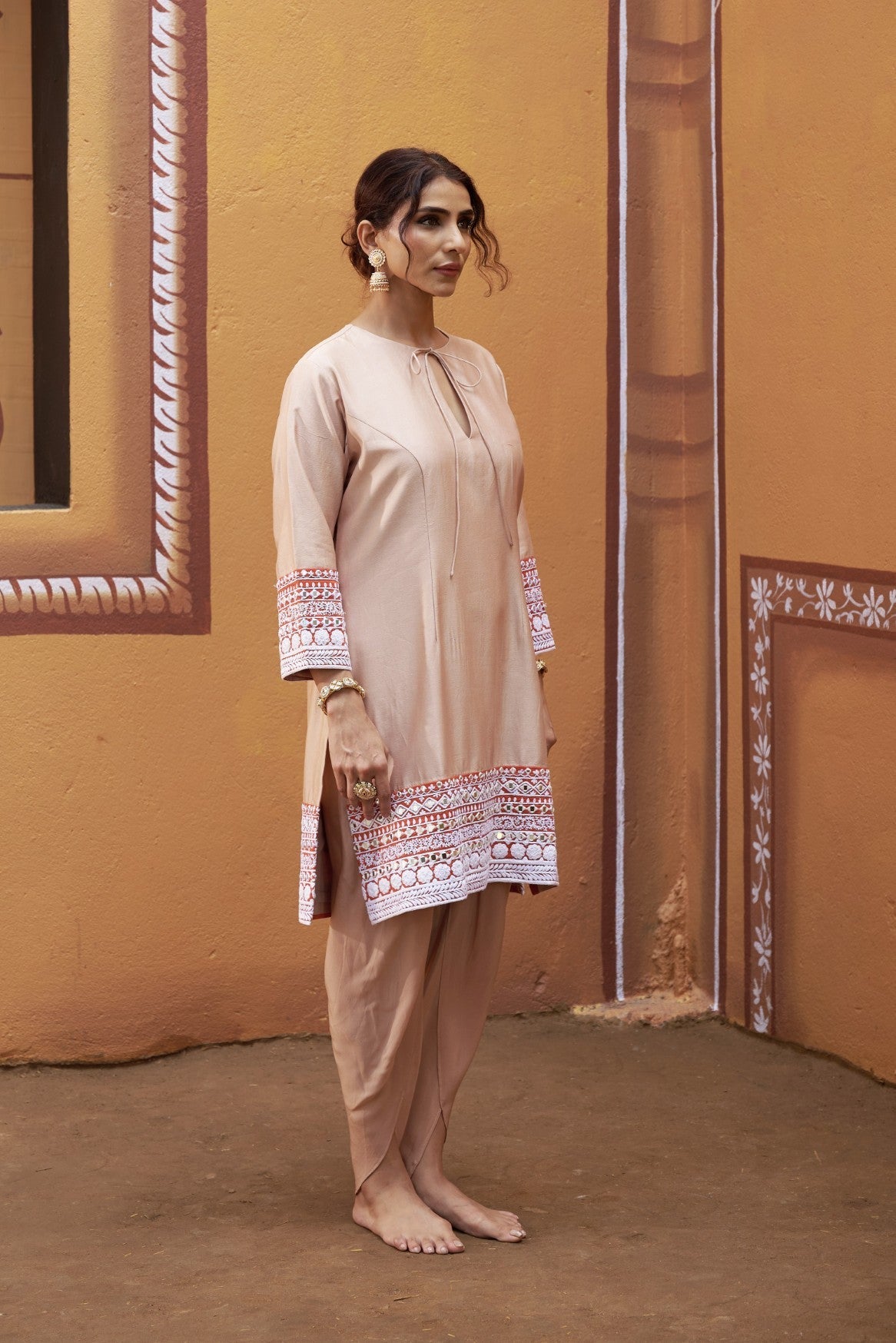half and half beige kurta with tulip pants