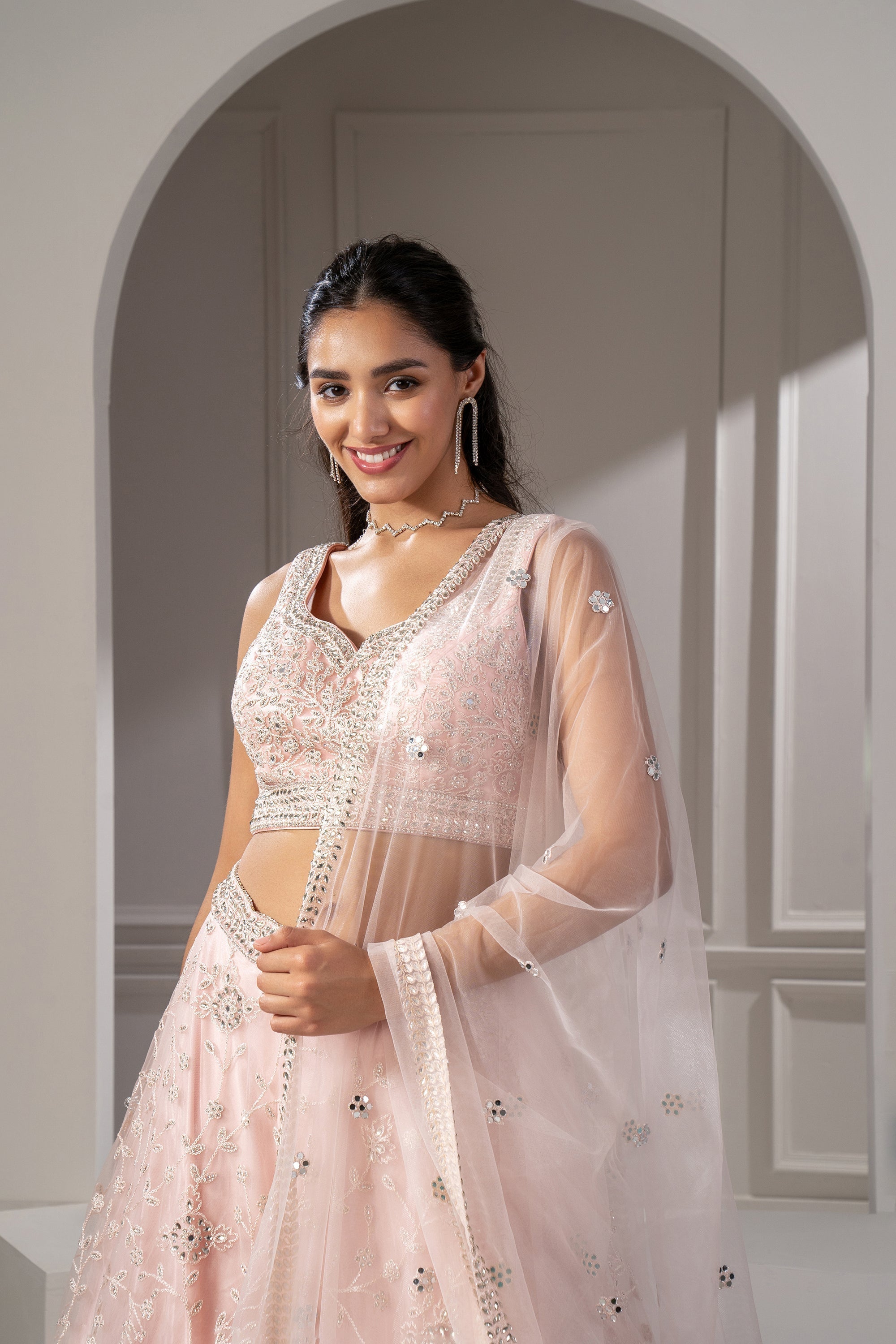 Blush Peach Organza Net Lehenga Set With Mirror, Thread And Sequins Embellishments,