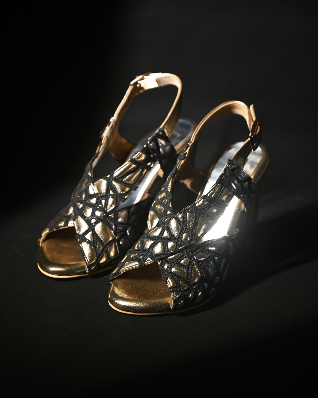 Black Webbed Detailing With Cushioned Gold And Silver Sling Back Heels
