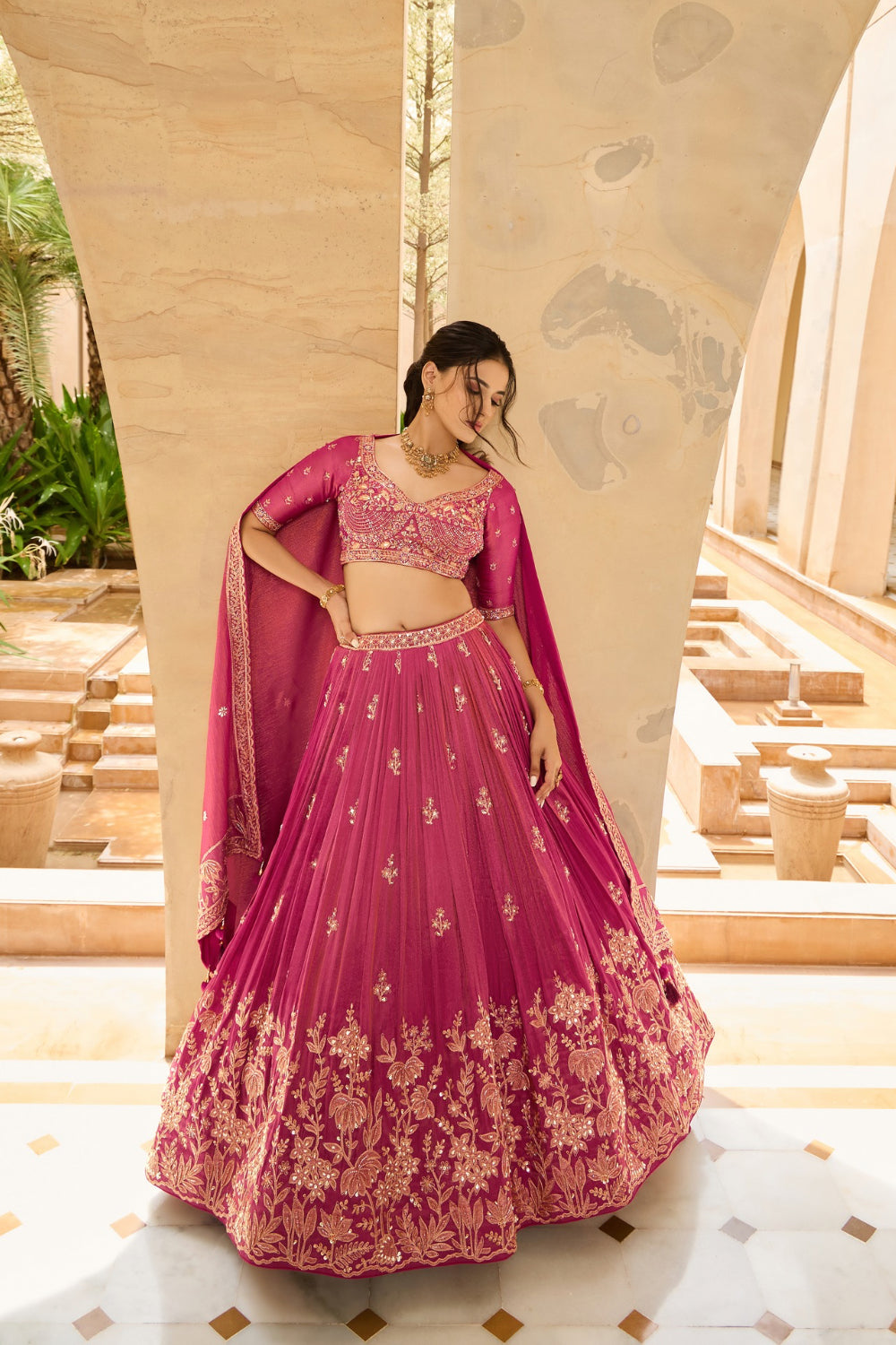 Dark fuchsia silk lehenga choli with sequins and thread work