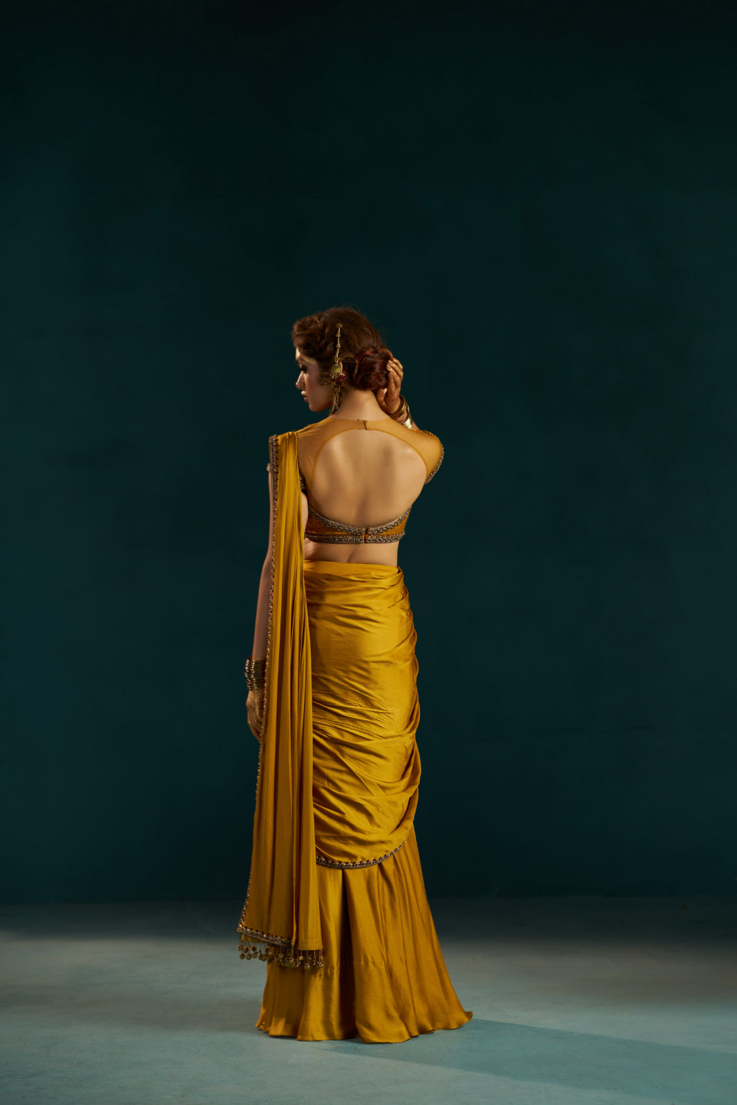 Mustard Yellow Modal Satin Drape Saree with Hand-Embellished Blouse.