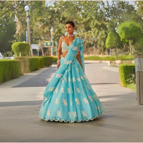 Image of Embellished Peaches Pink Of Shoulder Lehenga Set