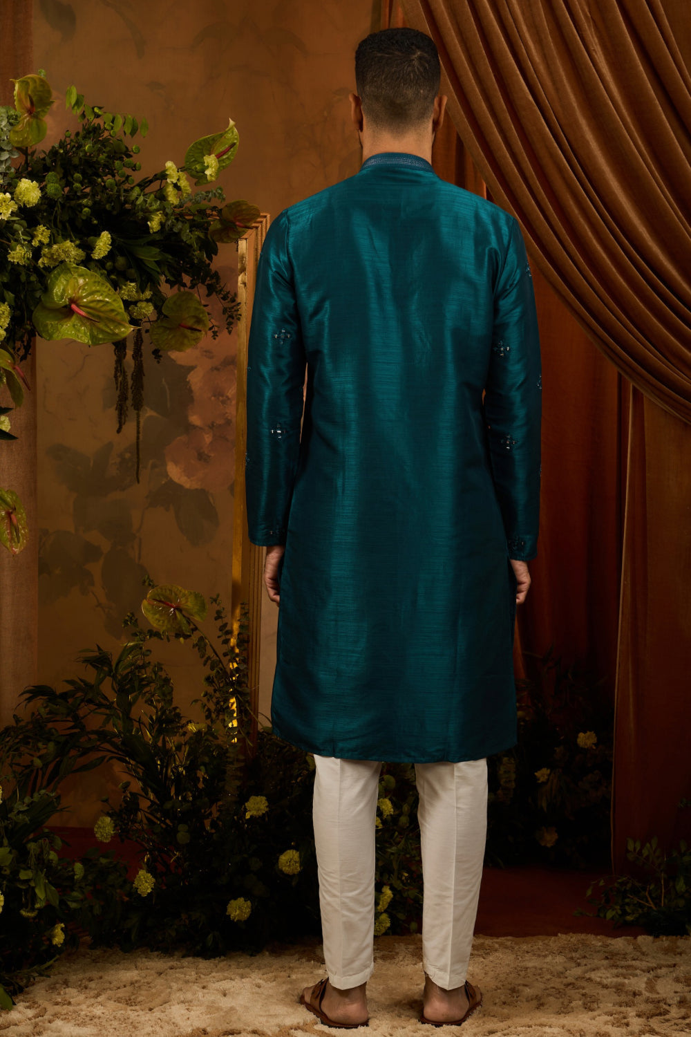 Deep teal silk kurta set with thread and mirror work