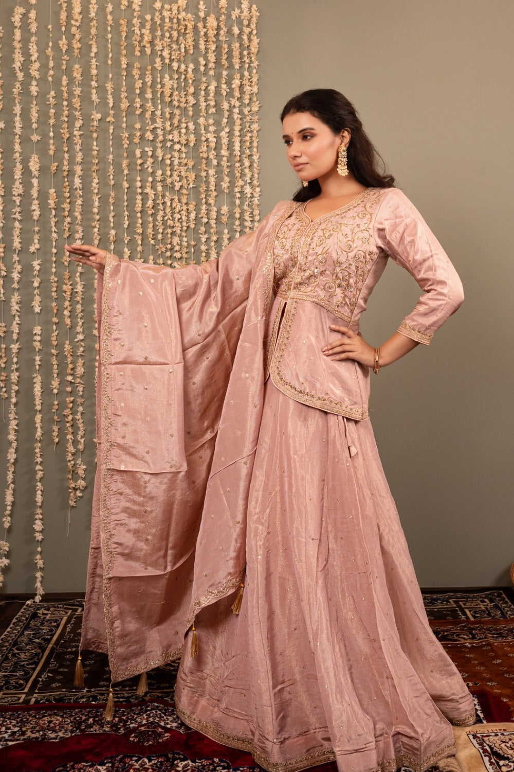 Dusty pink tissue silk lehenga choli with handwork