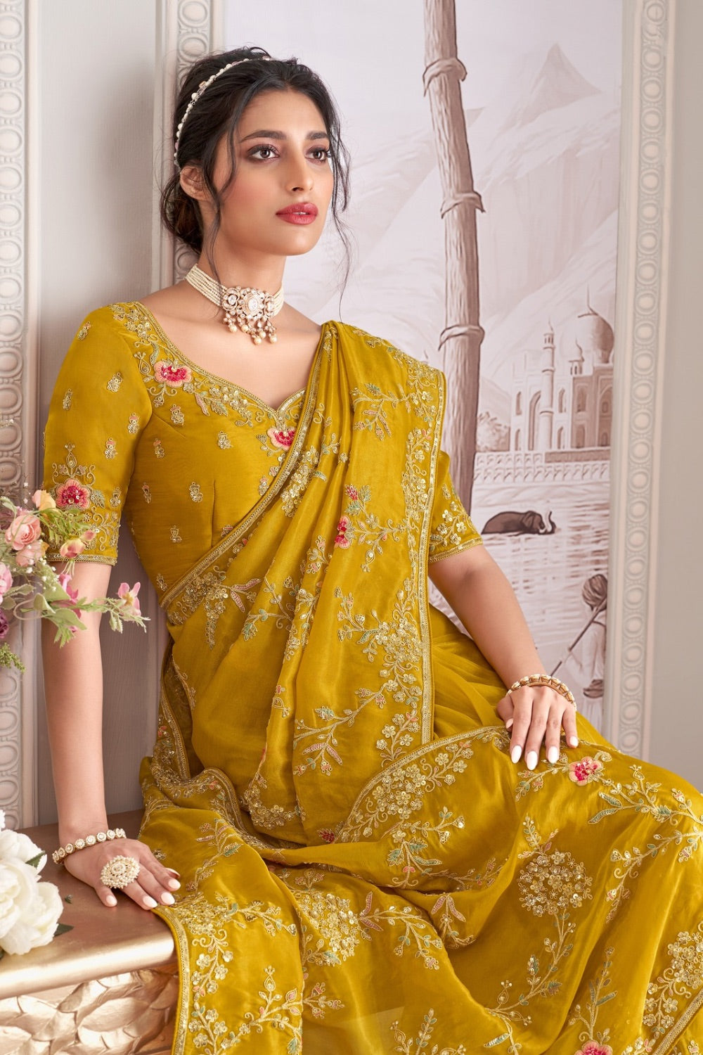 Bright yellow organza silk saree with unstitched blouse