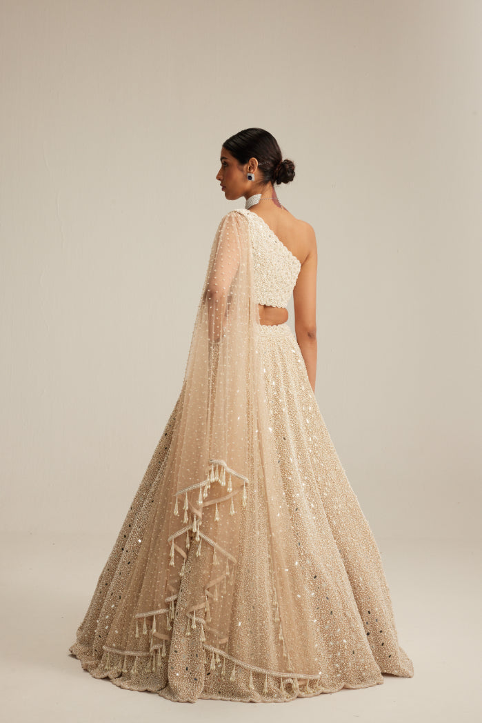 Light Beige Dense mirror and pearl one shoulder lehenga set