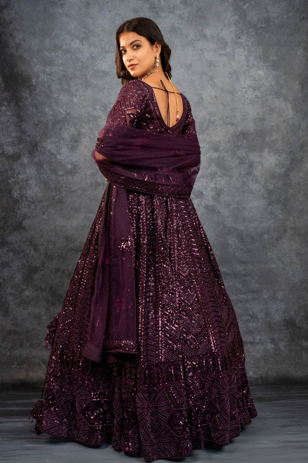 Wine net lehenga choli with sequins, hand cut dana and dori work