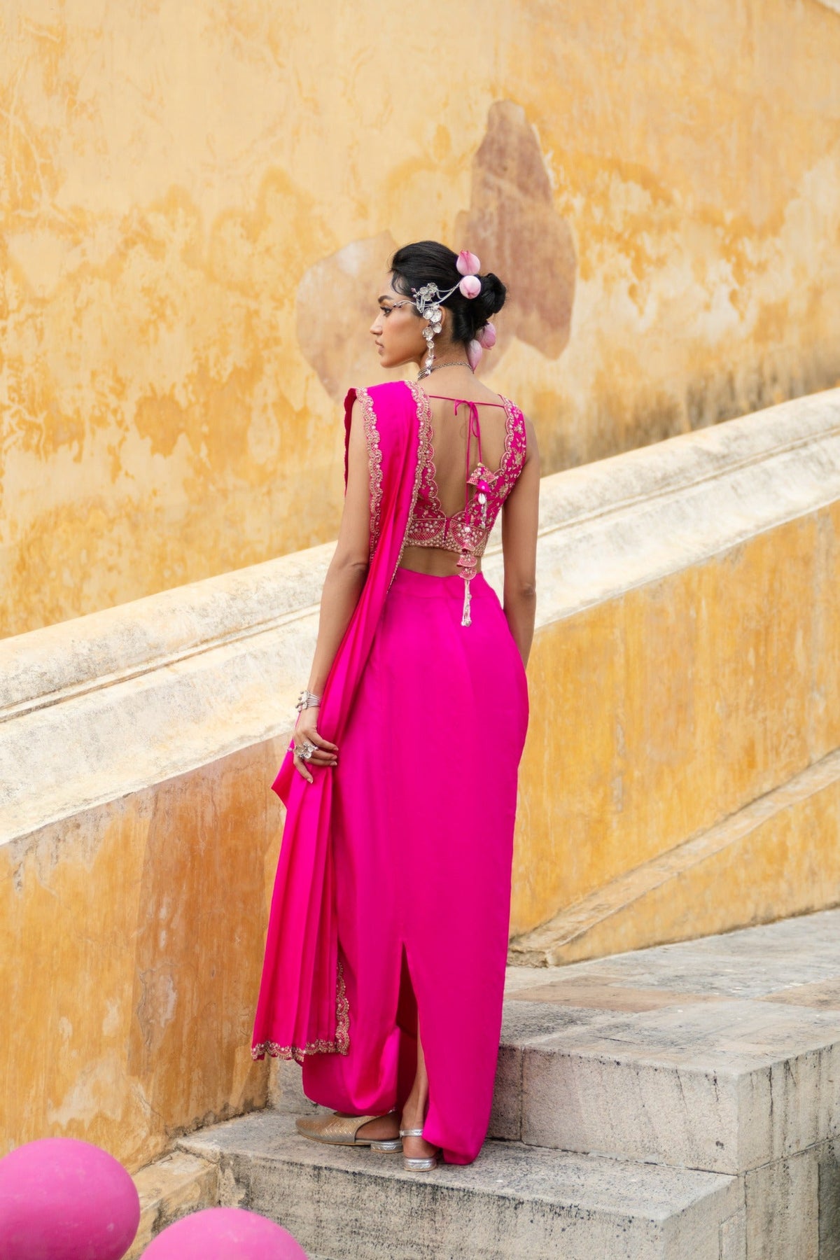 Bright fuschia draped saree