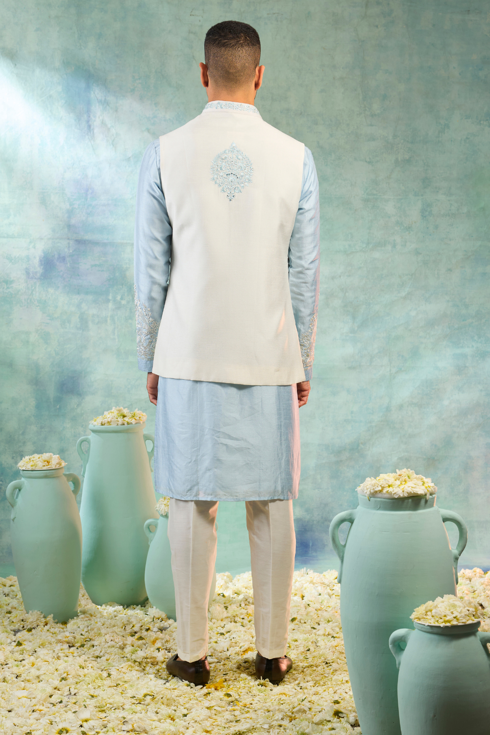 Baby blue silk kurta and pearl white koti with mirror embroidery and thread work