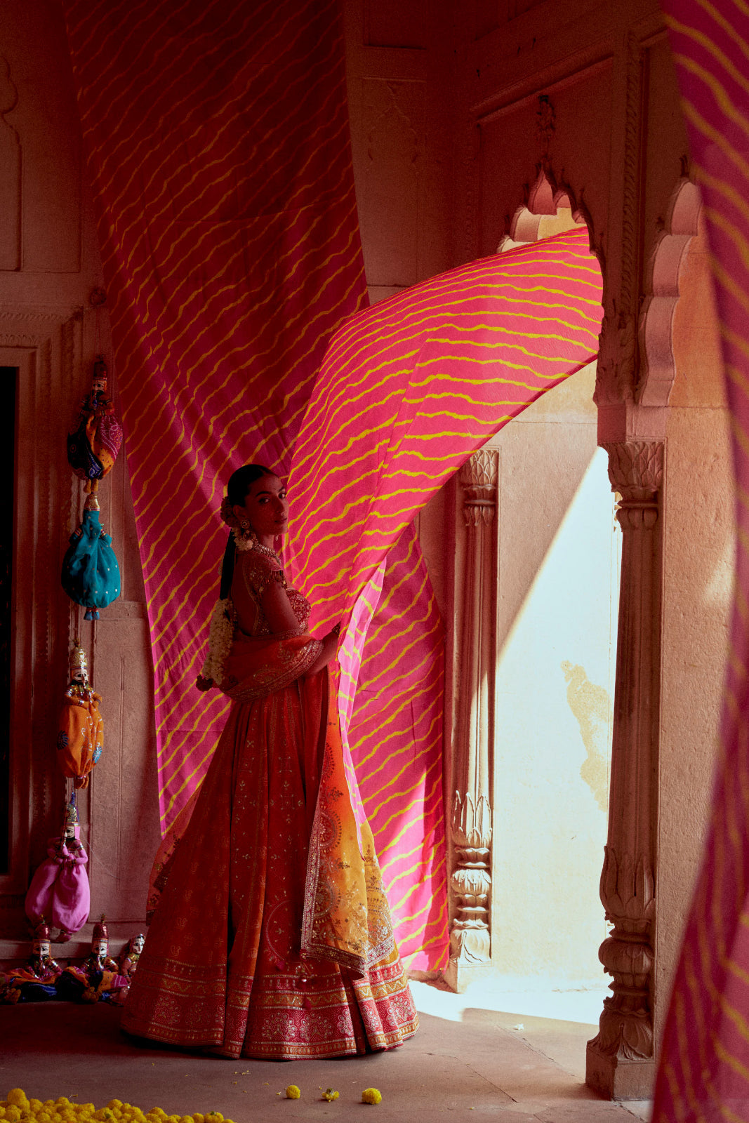 Rediant orange and red printed bandhej gota patti lehenga set