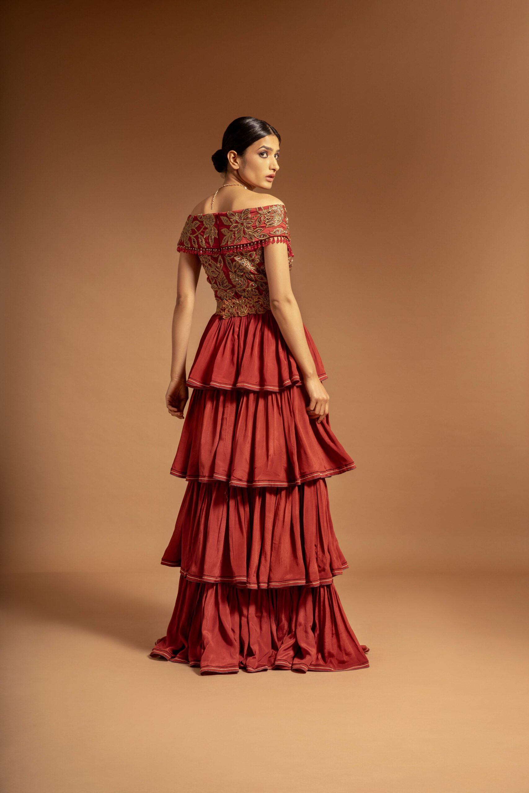 Maroon fully ajrakh patchworked layered gown