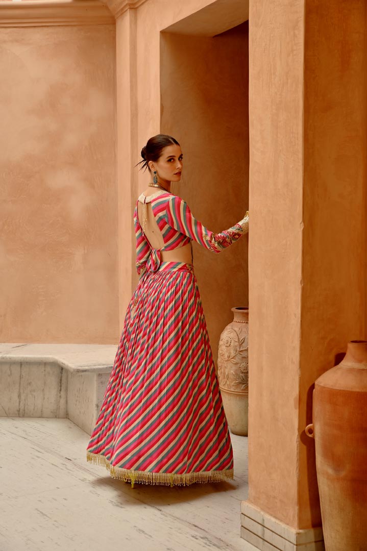 Image of Hot pink indi-leheriya blouse with tassel lehenga and dupatta set