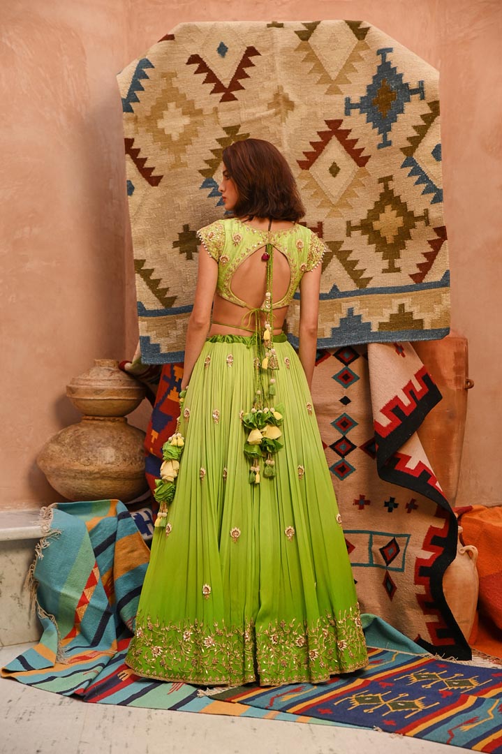 Image of Lime green ombre ruched lehenga with blouse and dupatta