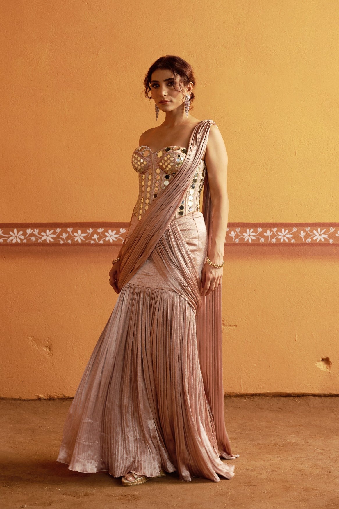 Hand embroidered corset with pleated pre draped saree